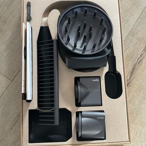 All new Dyson hair dryer attachment and a comb